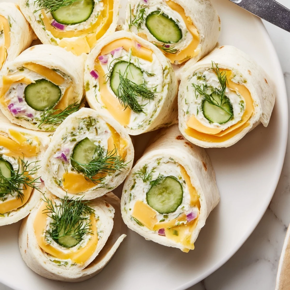 Serve these flavorful pickle-in-a-blanket rolls with mustard for a delicious party treat.  