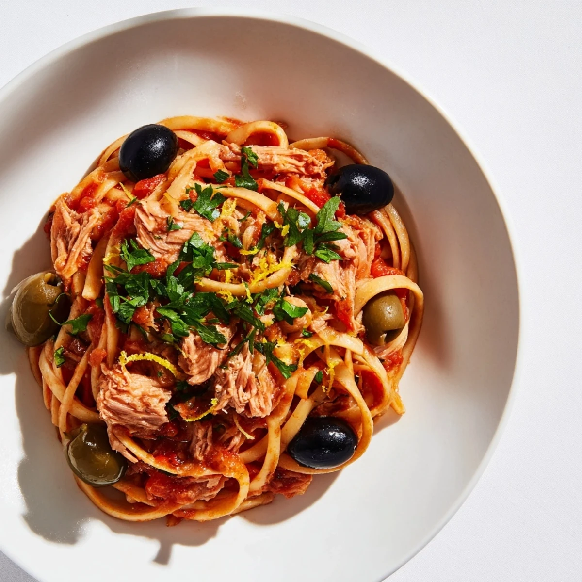 Pasta with Tuna, Olives & Capers: Flaky tuna and olives mixed with perfectly cooked pasta noodles.