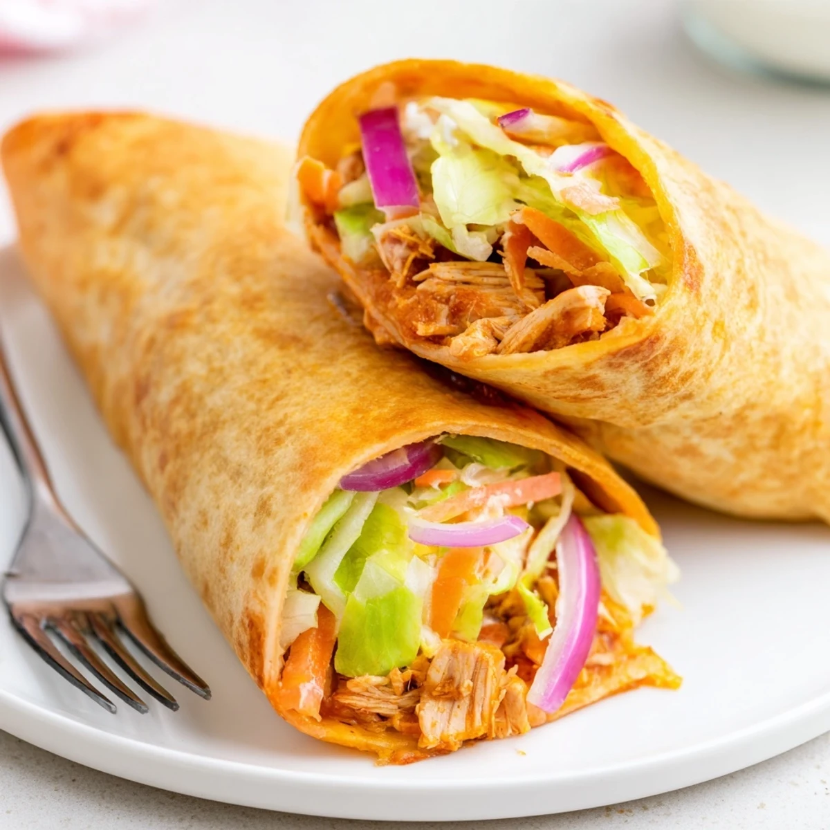 Imagine the amazing taste of Air Fryer Buffalo Turkey Christmas Wraps, a holiday feast in a wrap!