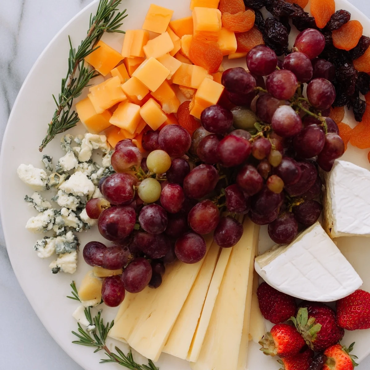 Enchanting Forest Grazing Board overflowing with vibrant fruits, cheeses, and crackers, a perfect party platter.