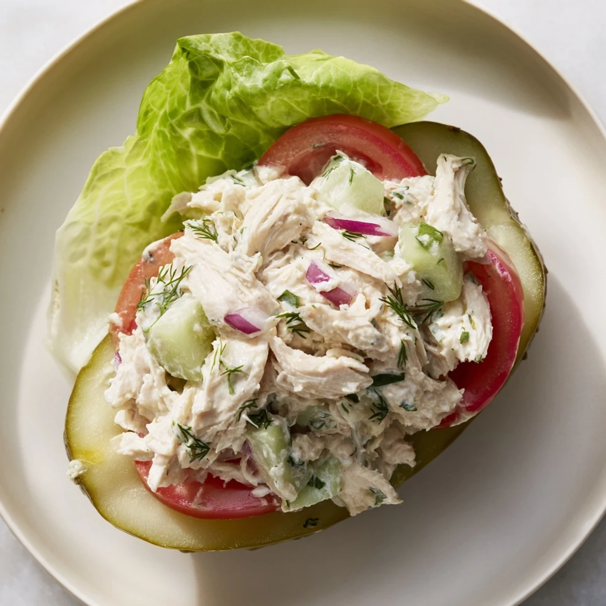 Savory Pickle Sandwich featuring a vibrant, protein-packed chicken salad filling, ready to serve.