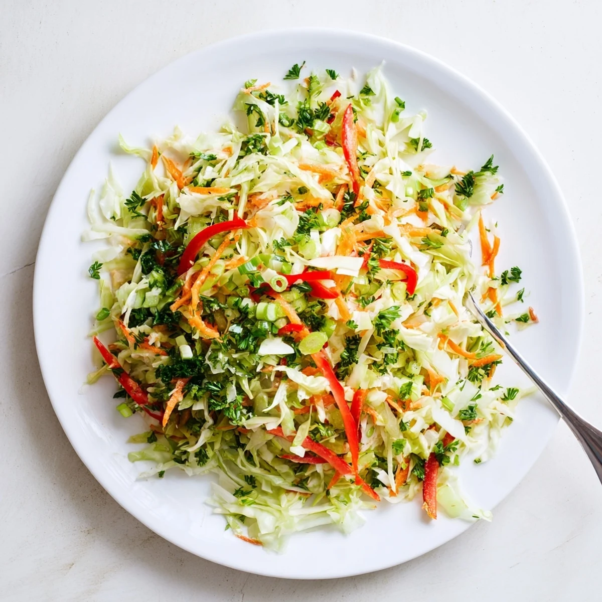 Zesty fermented cabbage Sauerkraut Slaw pairing perfectly with grilled sausages, showcasing a vibrant, probiotic-rich German side dish.