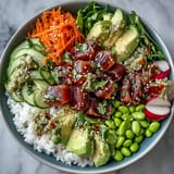 Fresh canned tuna poke bowl, a quick lunch with vibrant, crisp toppings.