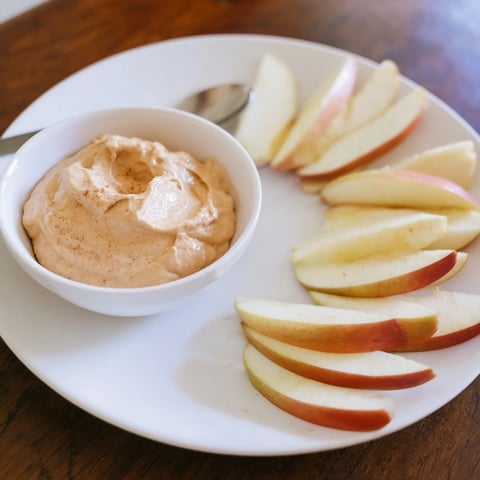 Crisp apple slices ready for dipping in creamy peanut butter with this quick Apple Slices recipe.
