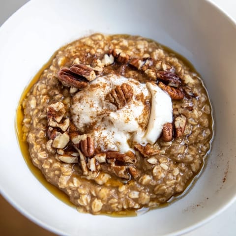 A close-up view of creamy pumpkin spice latte oats, perfect for a cozy fall breakfast.