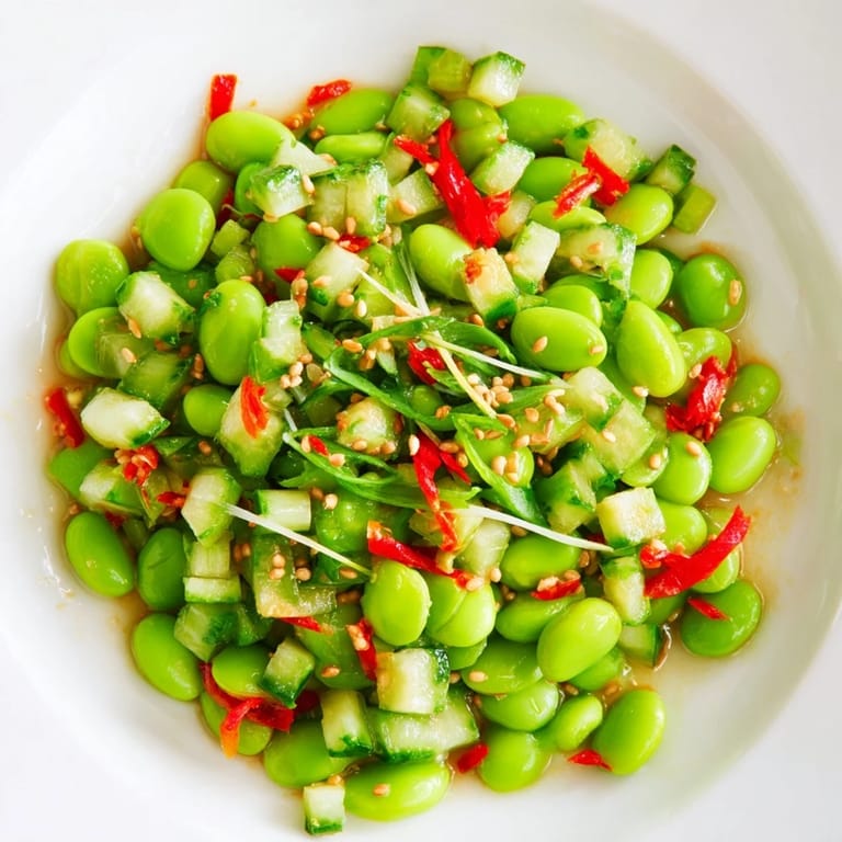 Vibrant edamame salad tossed with sesame dressing, a flavorful vegan side bursting with color.