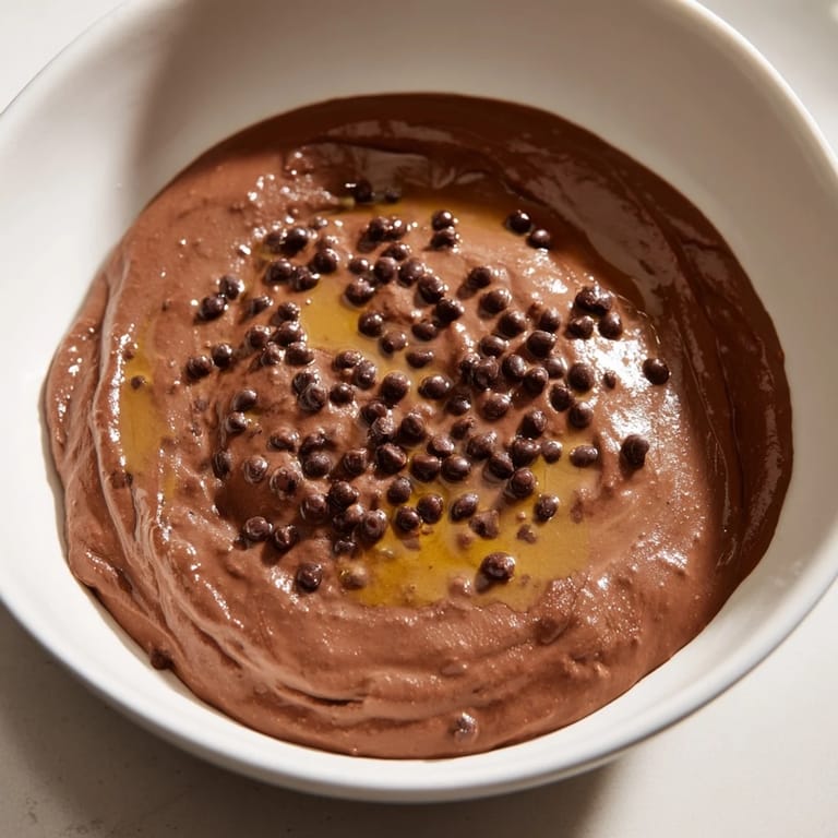A smooth, deep brown color, this chocolate hummus is blended to a silky-smooth, perfect dipping texture.