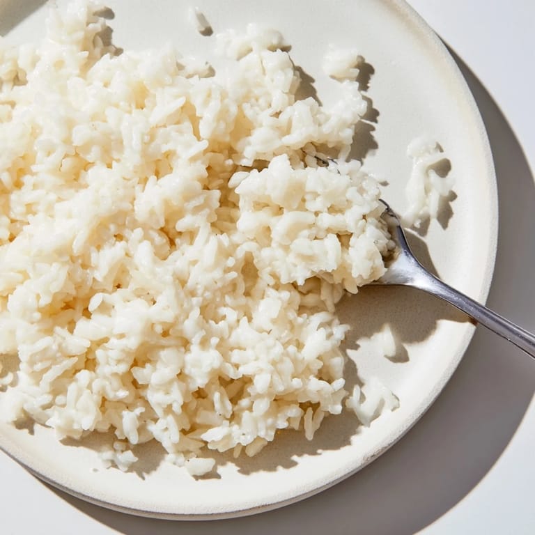 Enjoy the visually appealing, light Coconut Jasmine Rice, subtly sweet and ready to enhance any Asian-inspired dinner.