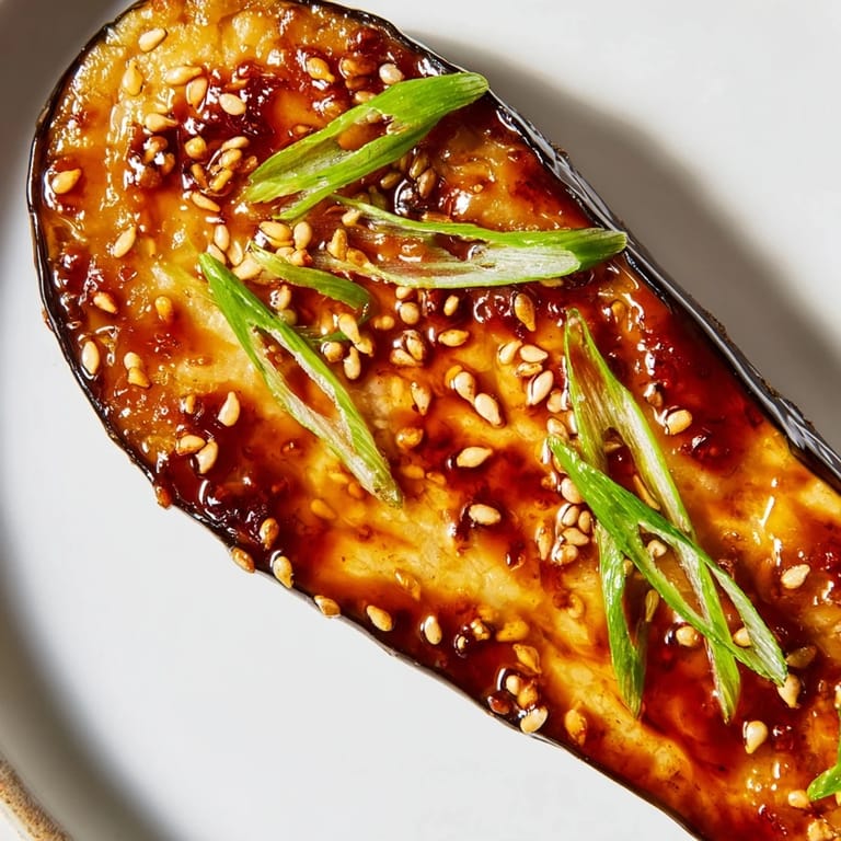 Sticky caramelized Miso Glazed Eggplant with crosshatched flesh, perfect as a vegetarian Japanese side dish.